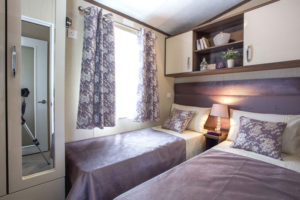 caravan bedroom purple in colour